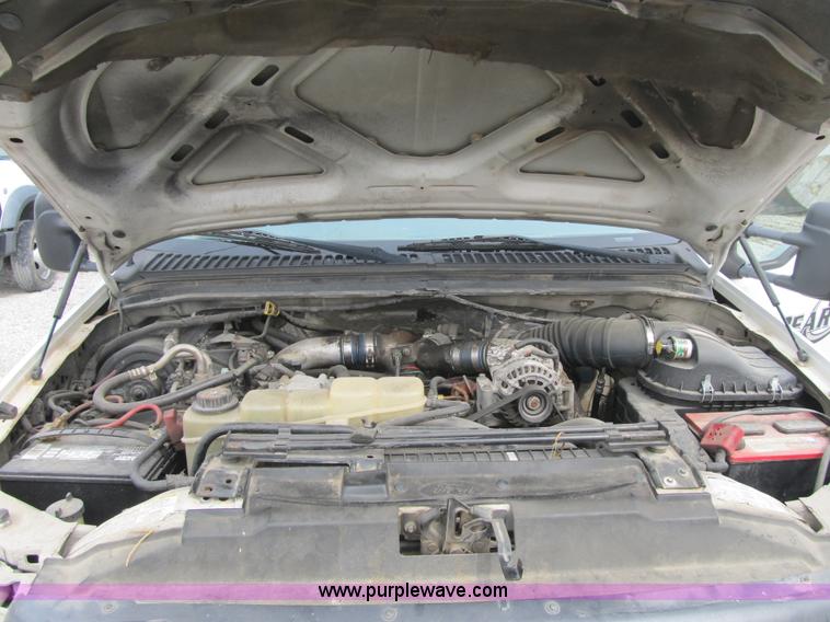 image for item AC9303 1999 Ford F350 Super Duty XL flatbed pickup truck