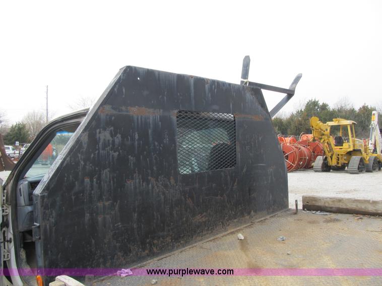 image for item AC9303 1999 Ford F350 Super Duty XL flatbed pickup truck