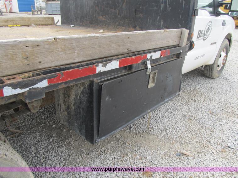 image for item AC9303 1999 Ford F350 Super Duty XL flatbed pickup truck