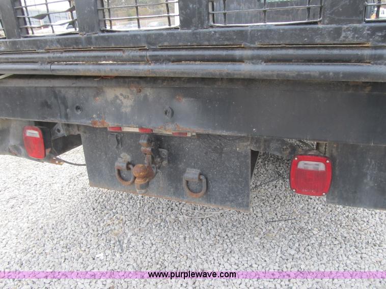 image for item AC9303 1999 Ford F350 Super Duty XL flatbed pickup truck