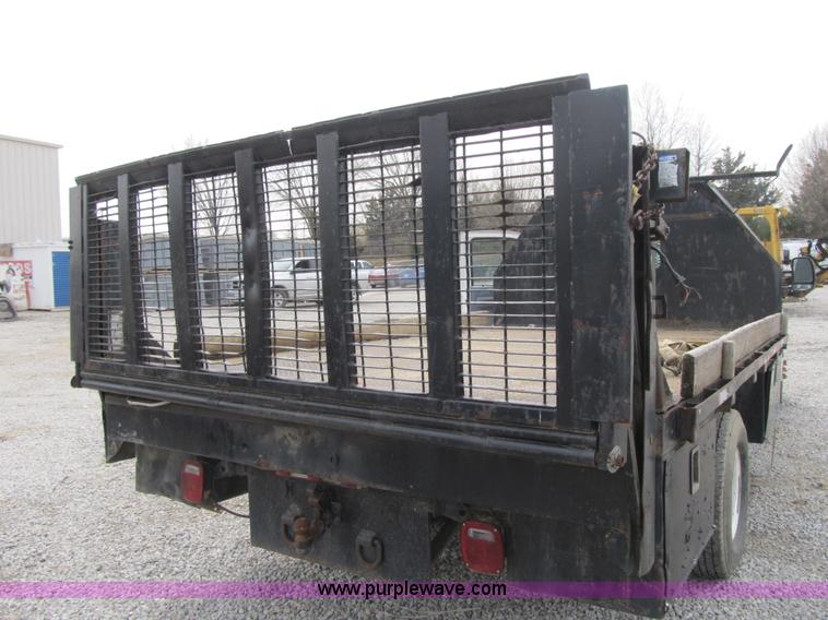 image for item AC9303 1999 Ford F350 Super Duty XL flatbed pickup truck