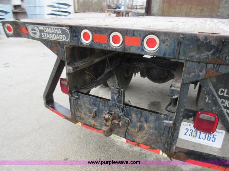 image for item AY9479 2001 Sterling M7500 Acterra flatbed truck