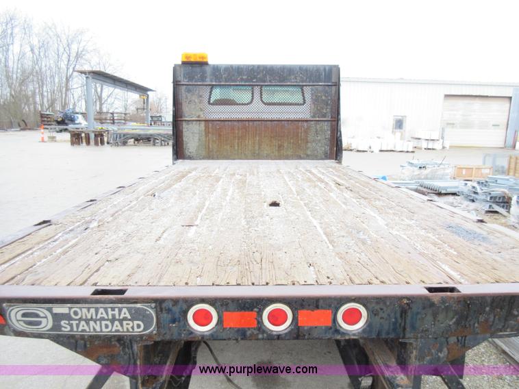 image for item AY9479 2001 Sterling M7500 Acterra flatbed truck