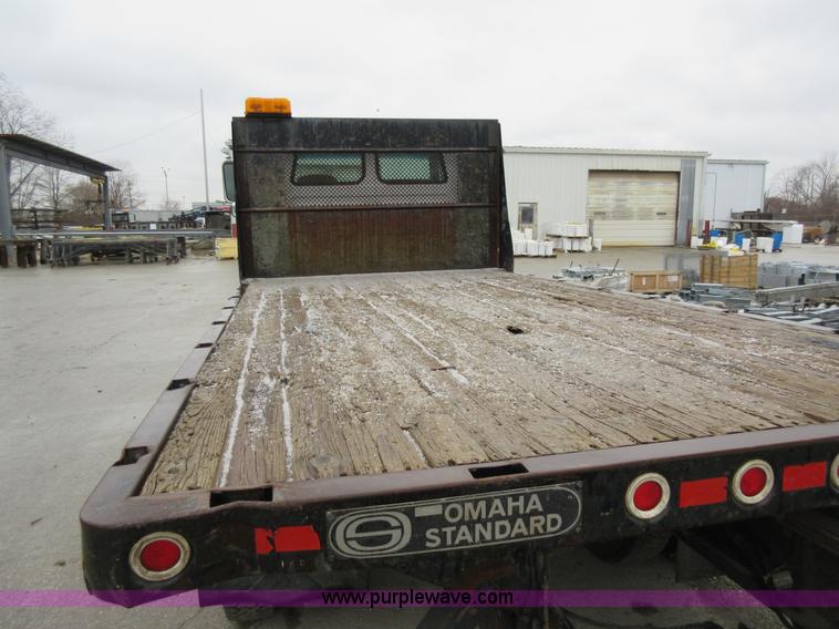 image for item AY9479 2001 Sterling M7500 Acterra flatbed truck