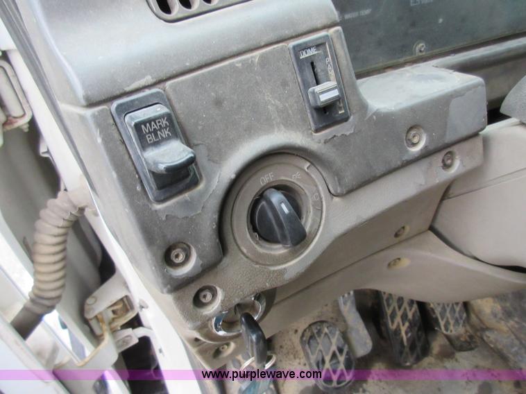 image for item AY9479 2001 Sterling M7500 Acterra flatbed truck