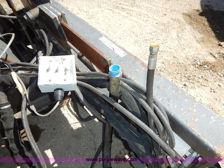 image for item BO9464 Coneqtec Universal ApIII skid steer planer attachment