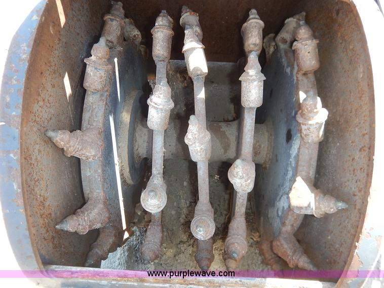 image for item BO9464 Coneqtec Universal ApIII skid steer planer attachment