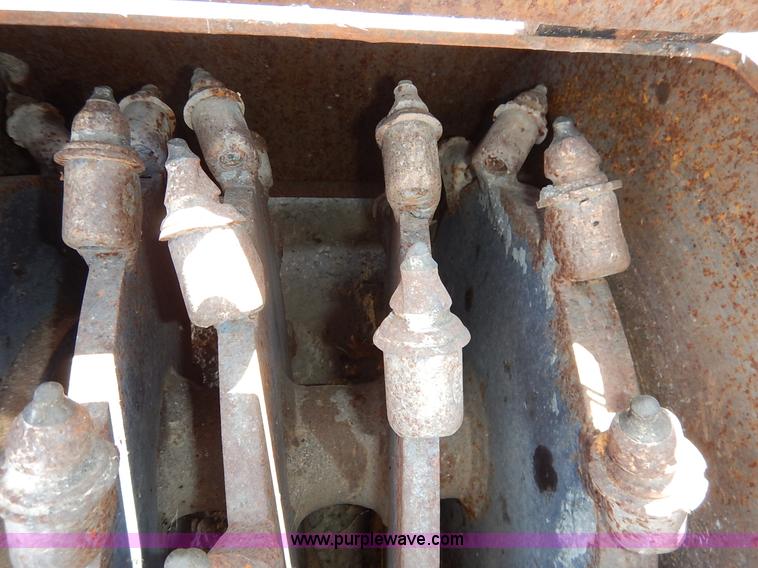 image for item BO9464 Coneqtec Universal ApIII skid steer planer attachment