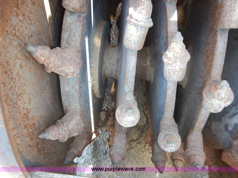 image for item BO9464 Coneqtec Universal ApIII skid steer planer attachment