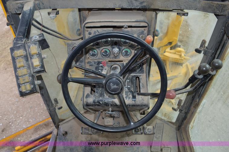 image for item E6200 John Deere 772A motor grader