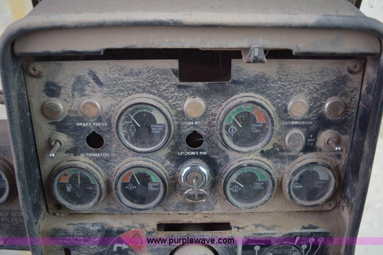 image for item E6200 John Deere 772A motor grader