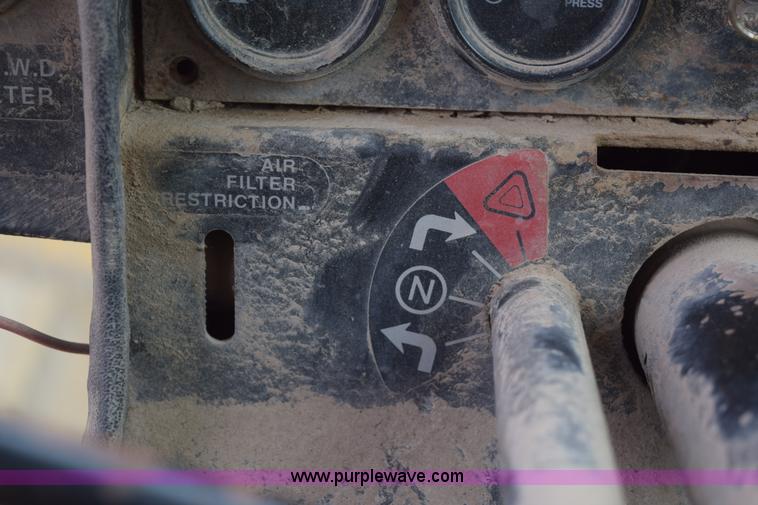 image for item E6200 John Deere 772A motor grader