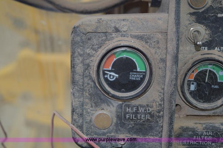 image for item E6200 John Deere 772A motor grader