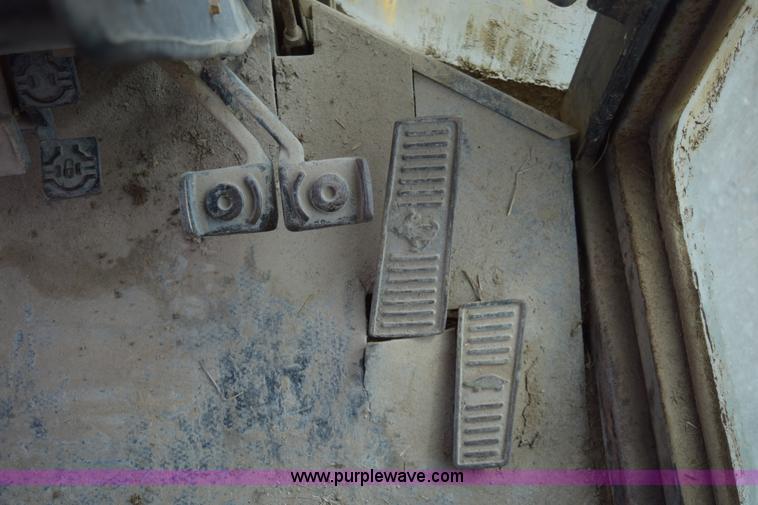 image for item E6200 John Deere 772A motor grader