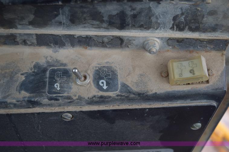 image for item E6200 John Deere 772A motor grader