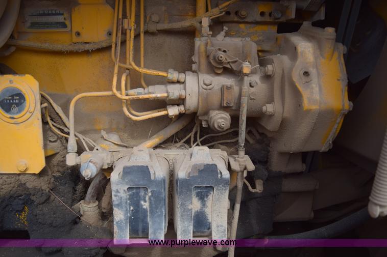 image for item E6200 John Deere 772A motor grader