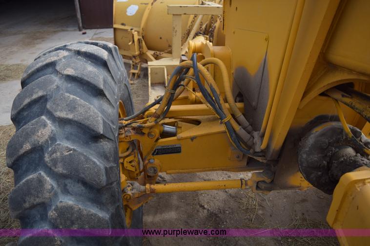 image for item E6200 John Deere 772A motor grader