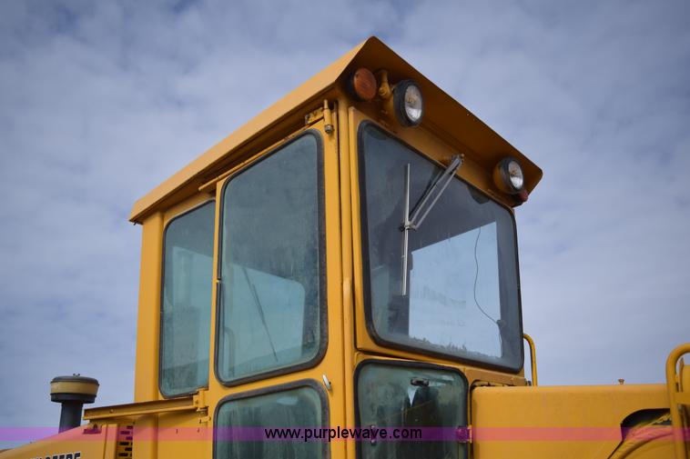 image for item E6200 John Deere 772A motor grader