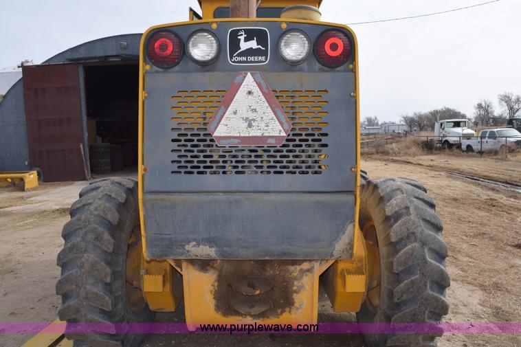 image for item E6200 John Deere 772A motor grader