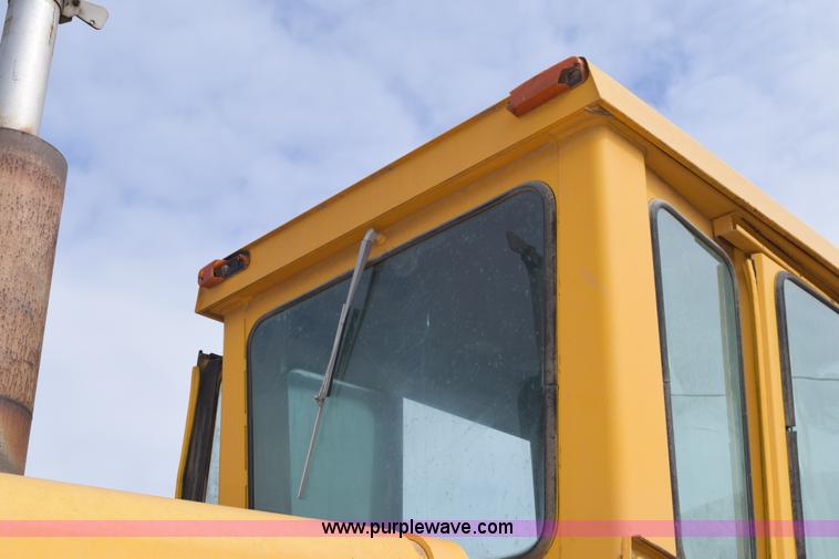 image for item E6200 John Deere 772A motor grader