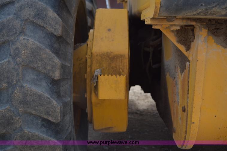 image for item E6200 John Deere 772A motor grader