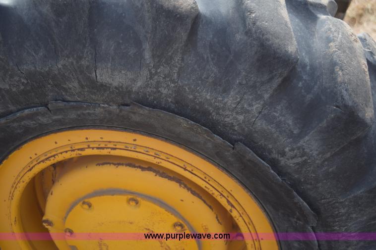 image for item E6200 John Deere 772A motor grader