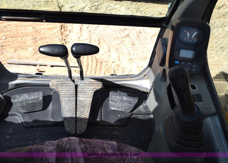 image for item E6284 2006 New Holland E130 SR compact excavator