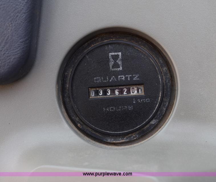 image for item E6284 2006 New Holland E130 SR compact excavator