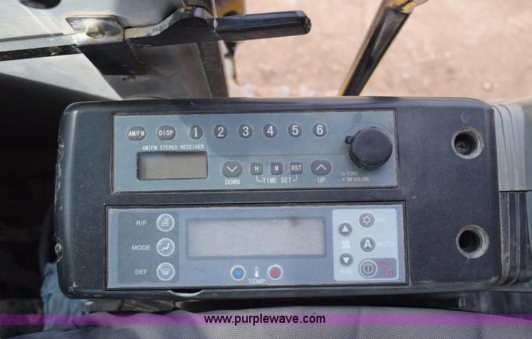 image for item E6284 2006 New Holland E130 SR compact excavator