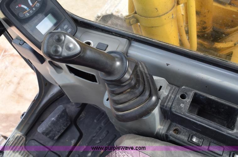 image for item E6284 2006 New Holland E130 SR compact excavator