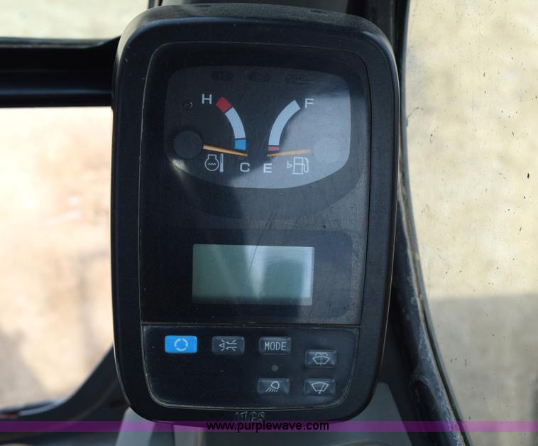 image for item E6284 2006 New Holland E130 SR compact excavator