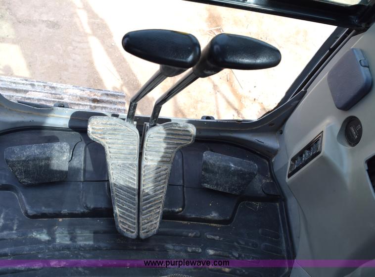 image for item E6284 2006 New Holland E130 SR compact excavator