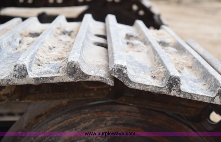 image for item E6284 2006 New Holland E130 SR compact excavator