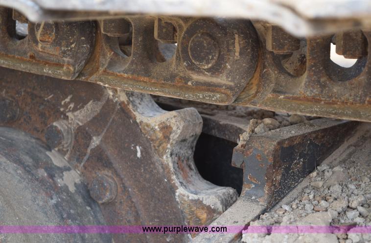 image for item E6284 2006 New Holland E130 SR compact excavator