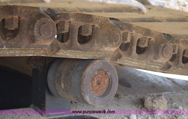 image for item E6284 2006 New Holland E130 SR compact excavator