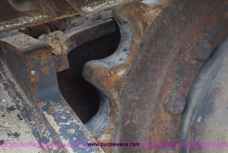 image for item E6284 2006 New Holland E130 SR compact excavator