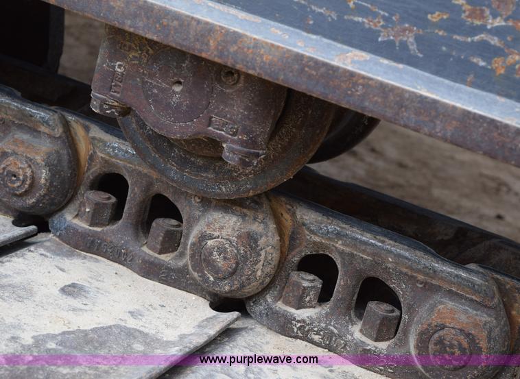 image for item E6284 2006 New Holland E130 SR compact excavator