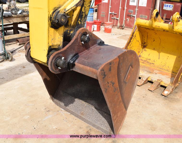image for item E6284 2006 New Holland E130 SR compact excavator