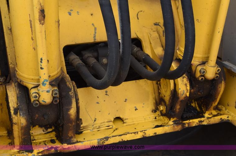 image for item E6284 2006 New Holland E130 SR compact excavator