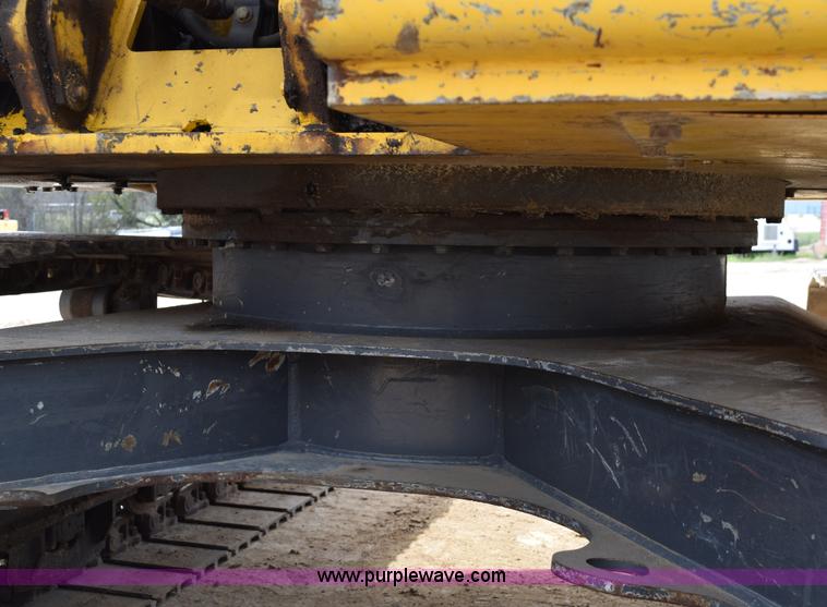 image for item E6284 2006 New Holland E130 SR compact excavator