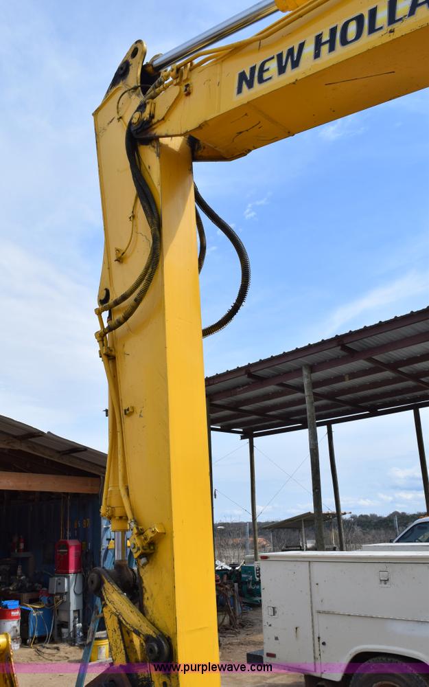 image for item E6284 2006 New Holland E130 SR compact excavator