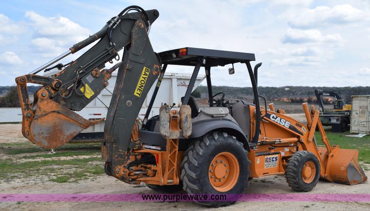 image for item E6286 2011 Case 580N backhoe with Bayonet Breaker