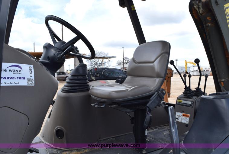 image for item E6286 2011 Case 580N backhoe with Bayonet Breaker