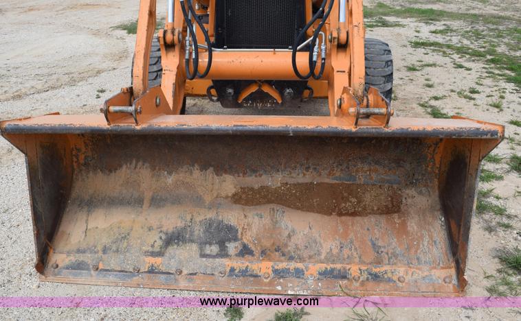 image for item E6286 2011 Case 580N backhoe with Bayonet Breaker