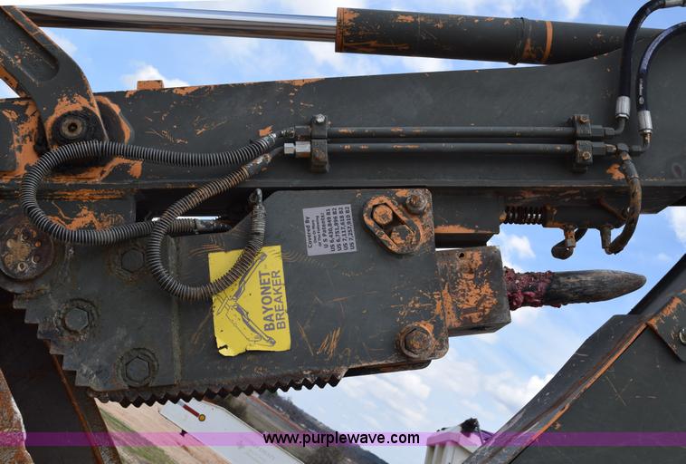 image for item E6286 2011 Case 580N backhoe with Bayonet Breaker