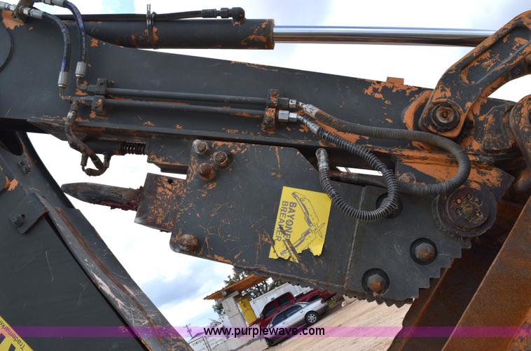 image for item E6286 2011 Case 580N backhoe with Bayonet Breaker