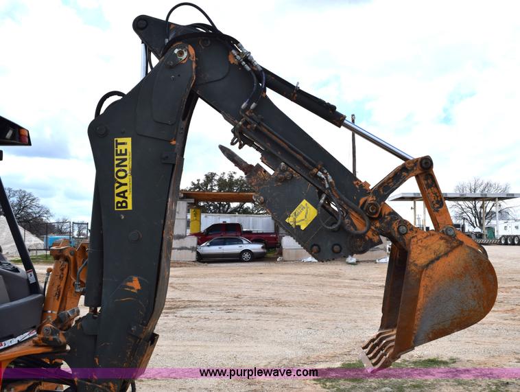 image for item E6286 2011 Case 580N backhoe with Bayonet Breaker