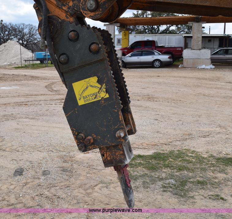 image for item E6286 2011 Case 580N backhoe with Bayonet Breaker