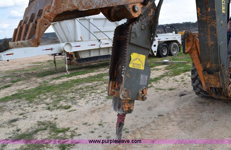 image for item E6286 2011 Case 580N backhoe with Bayonet Breaker