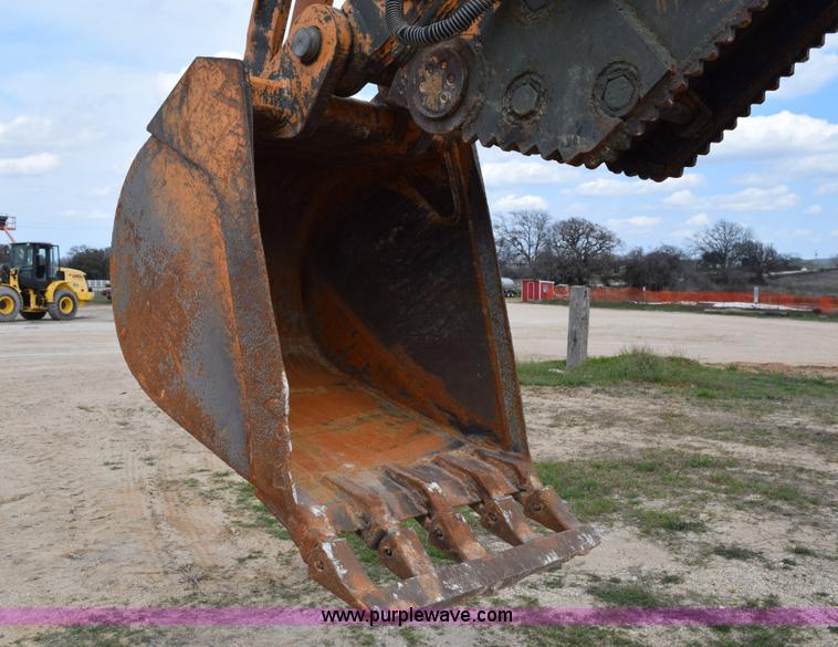 image for item E6286 2011 Case 580N backhoe with Bayonet Breaker